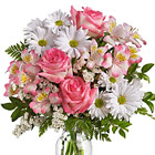 This year-round favorite features pretty pink roses, white daisy poms, alstroemeria, and accents designed and delivered in a clear glass vase. Charming! Great for a birthday, thank you, thinking of you, love, and new baby girls, too. USA and Canada florist delivery.
