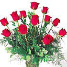 Send a message of love with one dozen gorgeous, long-stem roses beautifully arranged with fresh foliage in a glass vase. When ordering, just note the color of roses you prefer. Prices vary according to stem length.